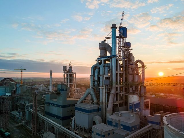 aerial-view-cement-factory-with-high-concrete-plant-structure-tower-crane-industrial-production-area-manufacture-global-industry-concept